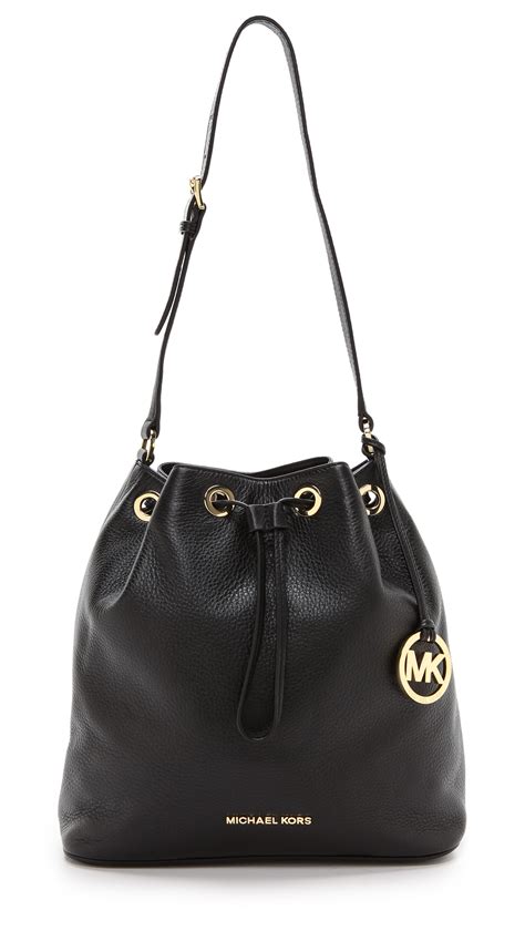 michael kors bucket drawstring bag with lock charm|Michael Kors saffiano leather tote.